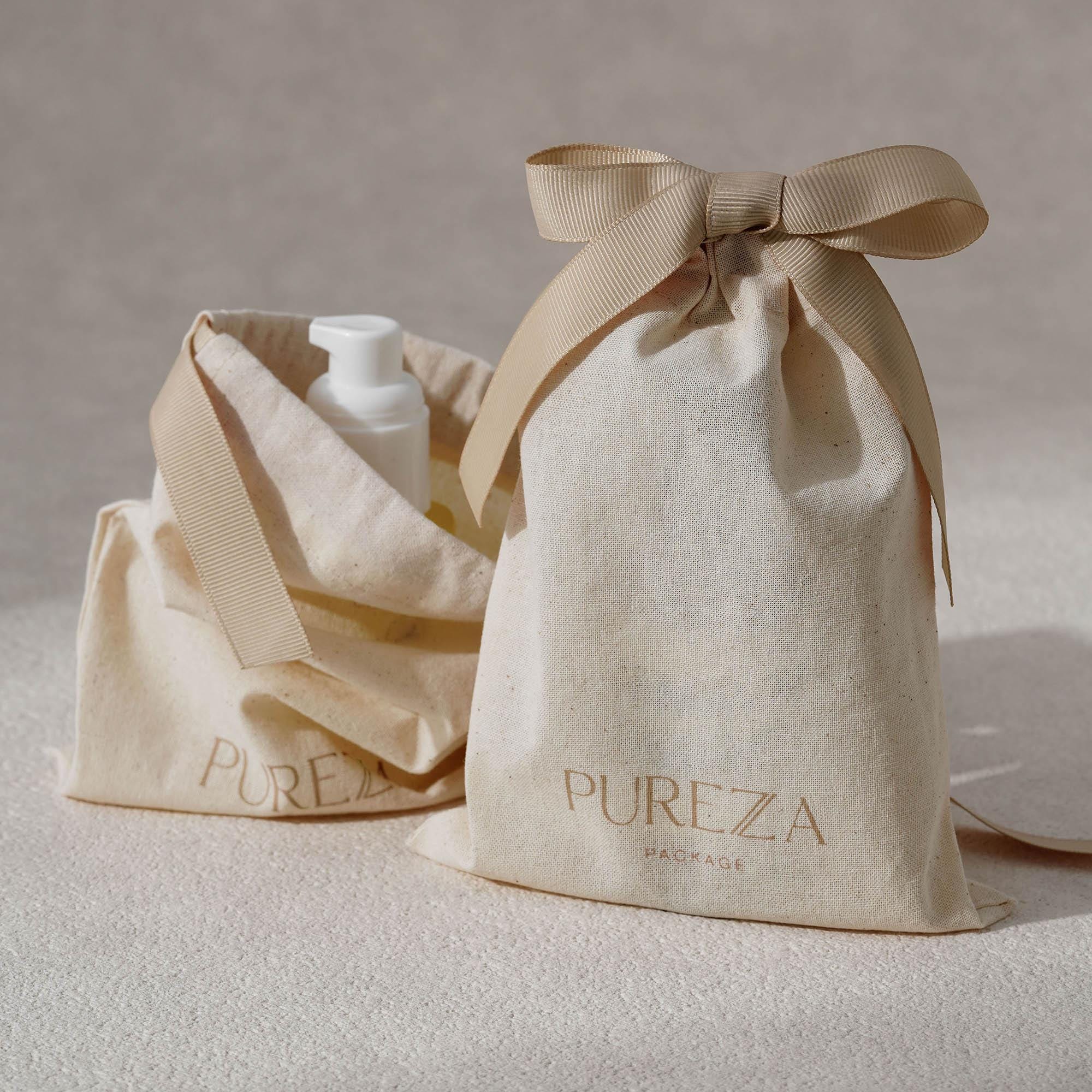Pochette à cordon en coton nat - Luxury Skincare Gifts avis et prix