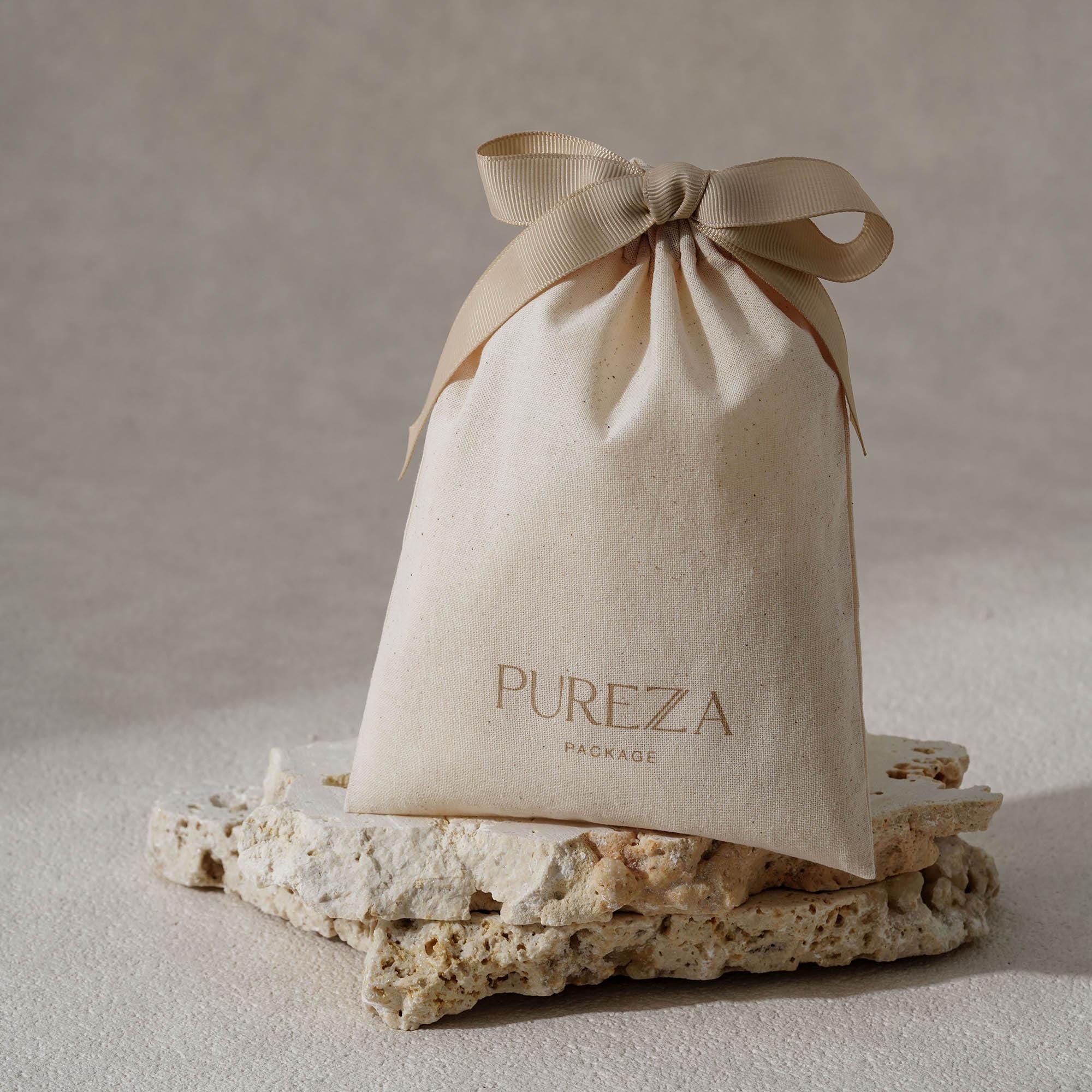 Pochette à cordon en coton nat - Luxury Skincare Gifts avis et prix